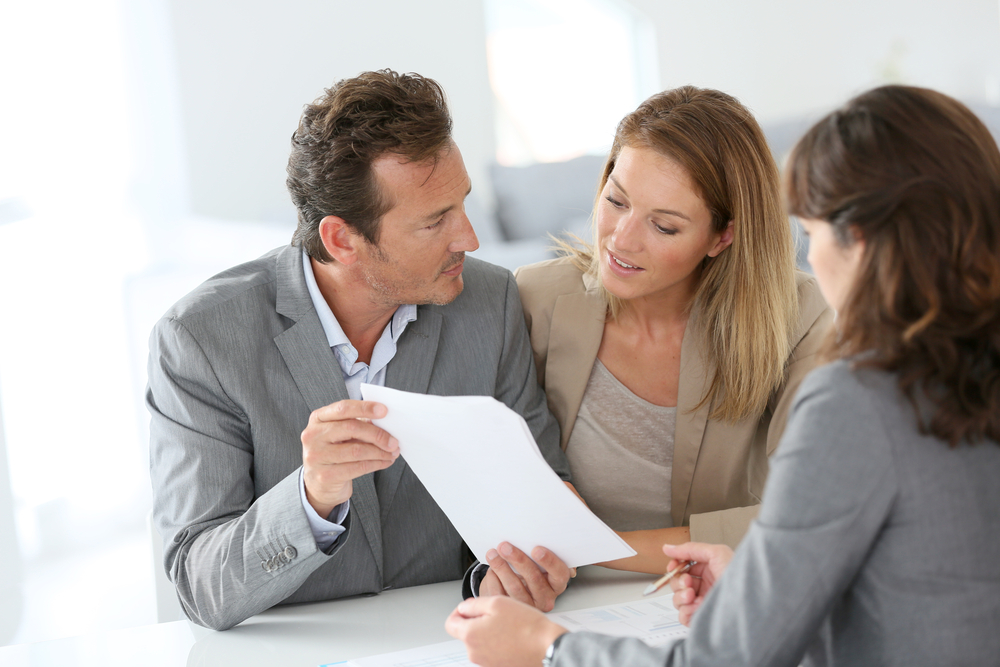 Couple meeting financial adviser for loan granting-2